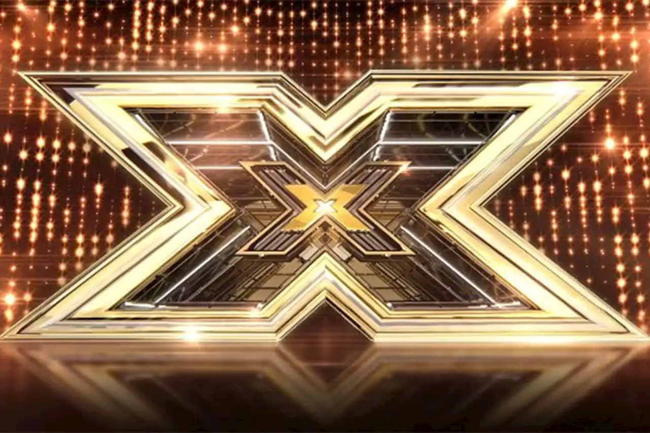 X Factor legend reveals first picture of her baby bump