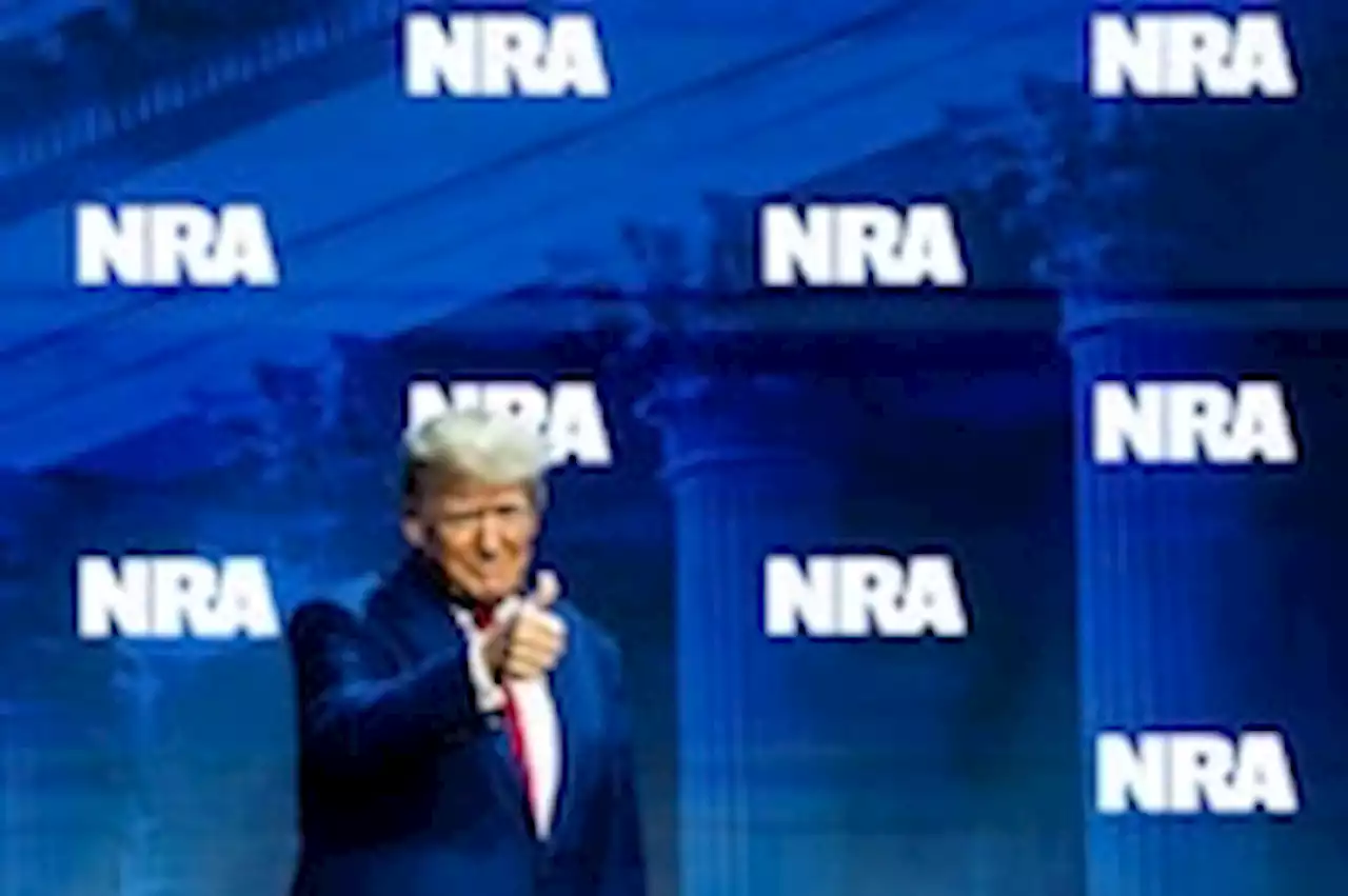 Trump, in legal peril, draws cheers at NRA convention; Pence draws boos