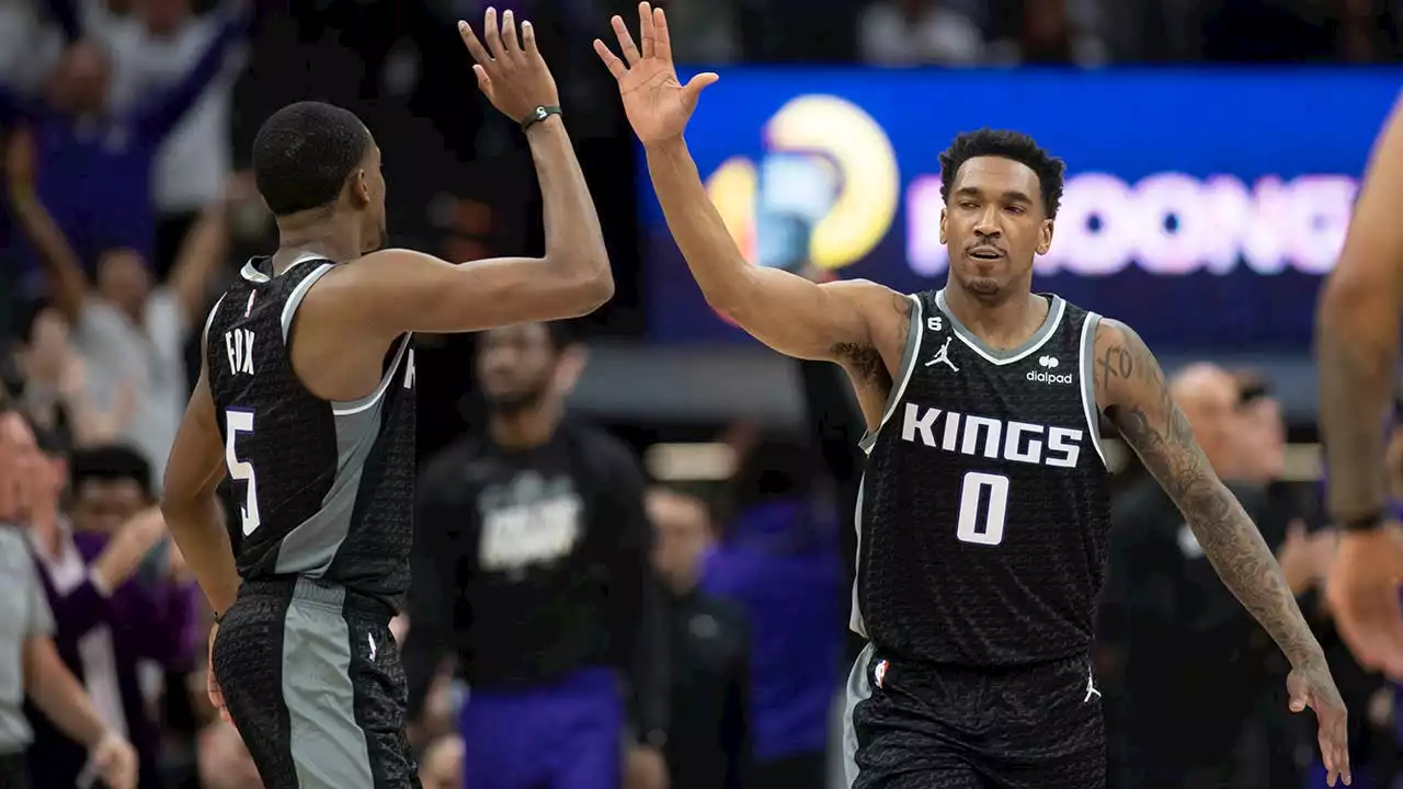 Kings take down defending champion Warriors in first playoff game in 17 years