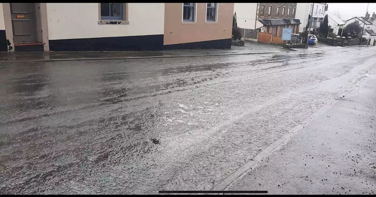 Fury over treacherous road 'with constant river of water' running down it