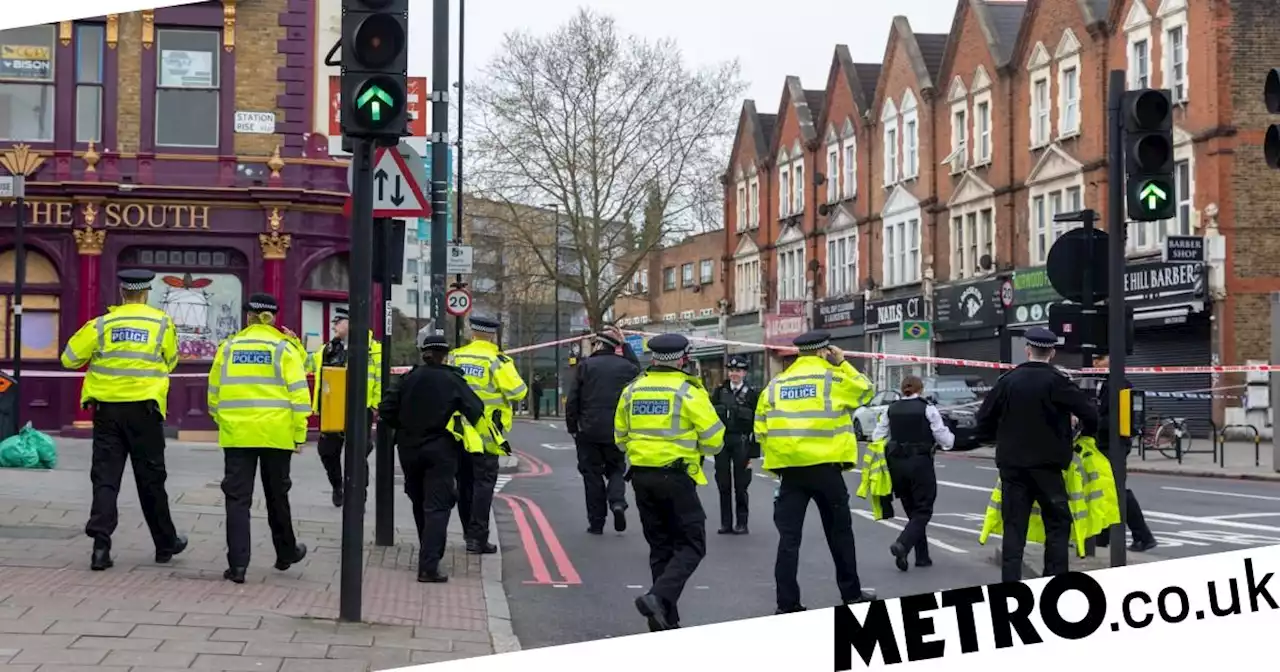 Man, 20, collapses and dies inside shop after stabbing near rail station