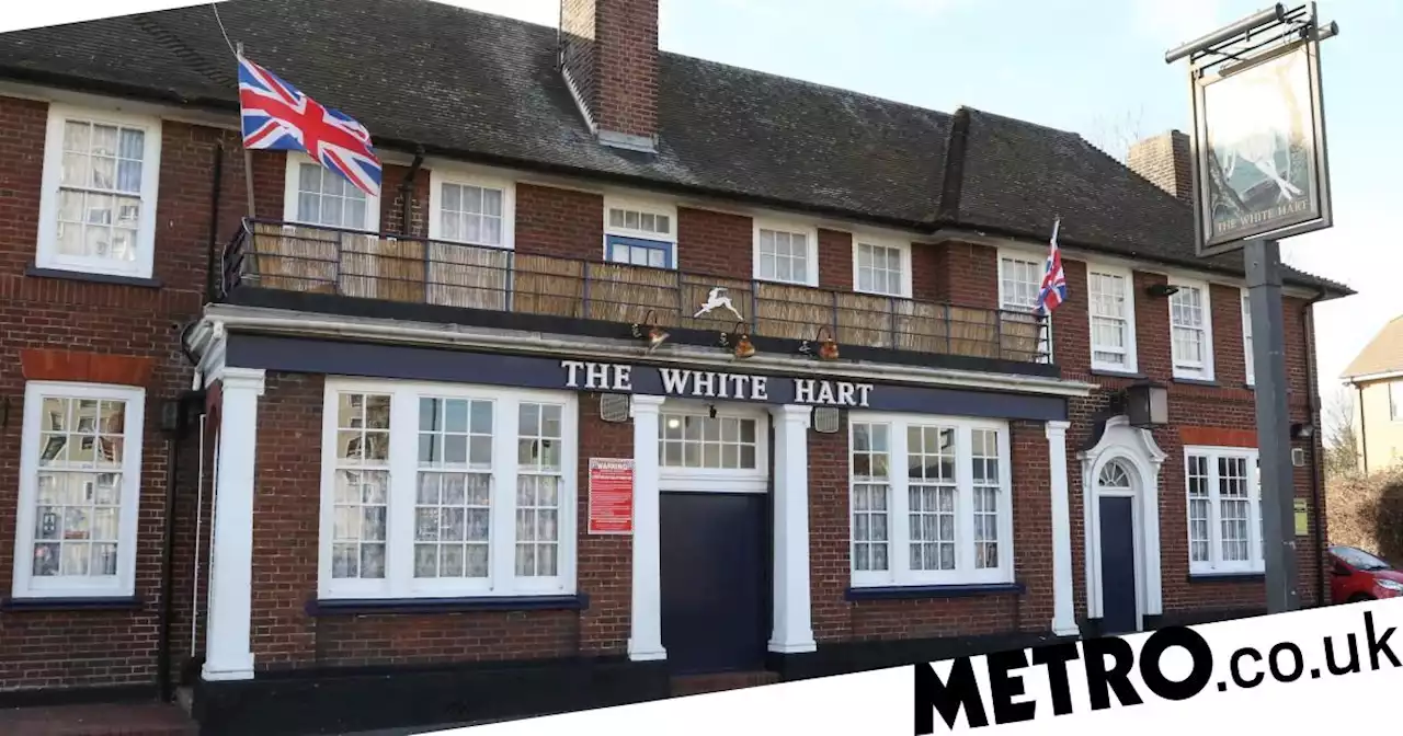 Windows damaged and graffiti scrawled on pub at centre of golliwog row