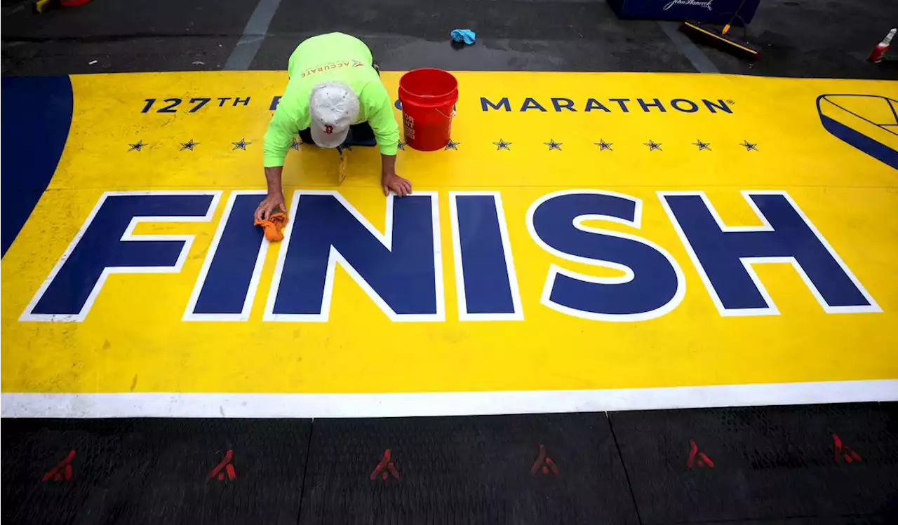 Fast and decorated field gathers for start of 127th Boston Marathon