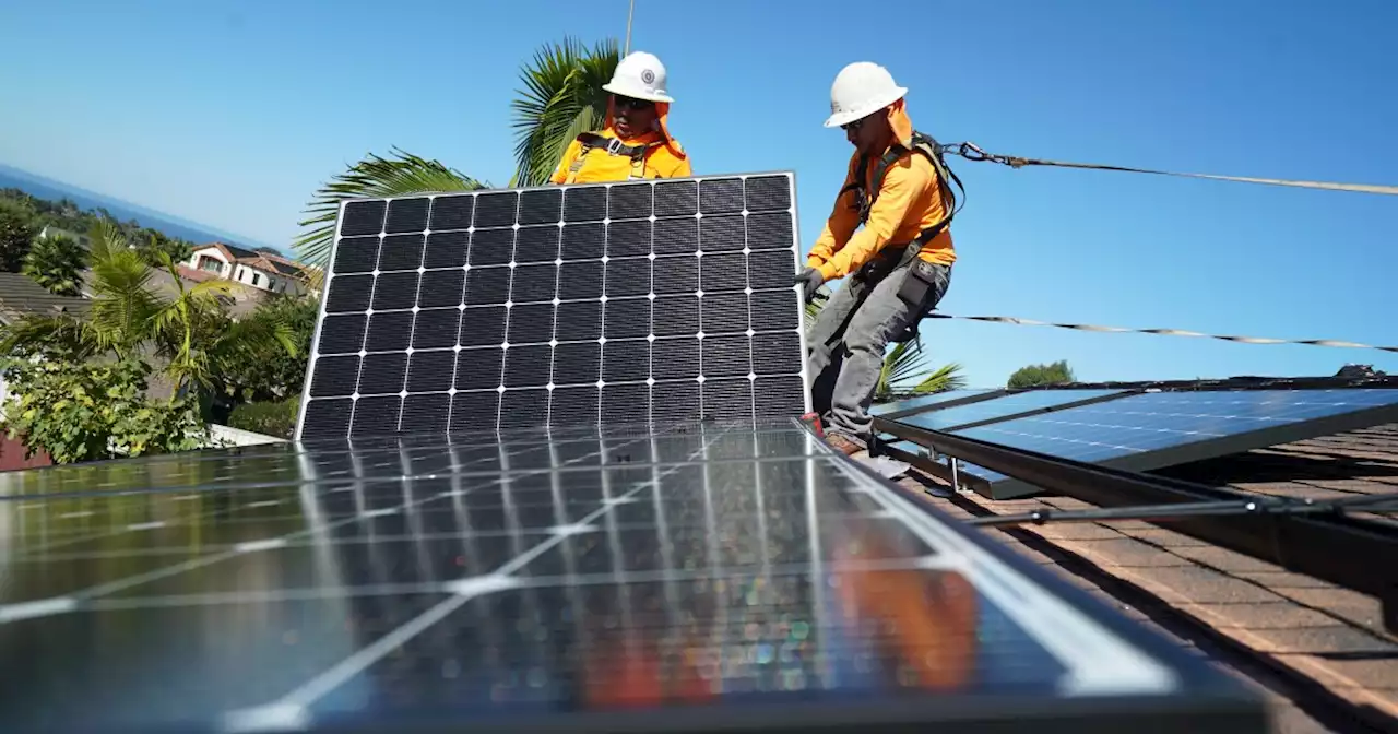 Solar installers are busy working to beat new solar rules