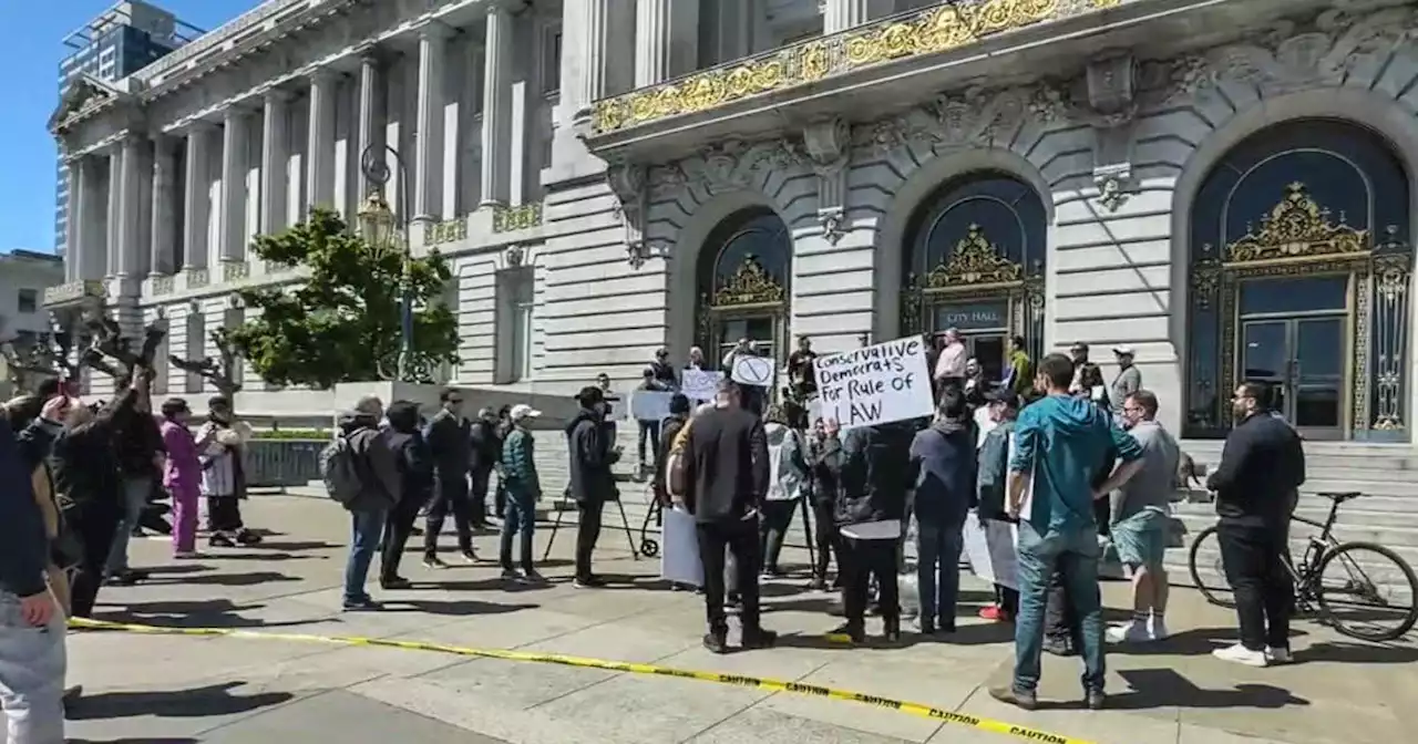 Demonstrators at San Francisco City Hall demand action on street crime