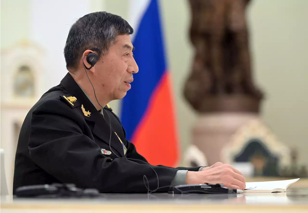 China defense official meets Russia's Putin amid weapons transfer scrutiny