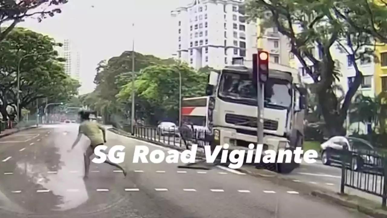 Singapore woman narrowly escapes getting struck by garbage truck in Havelock (Video)