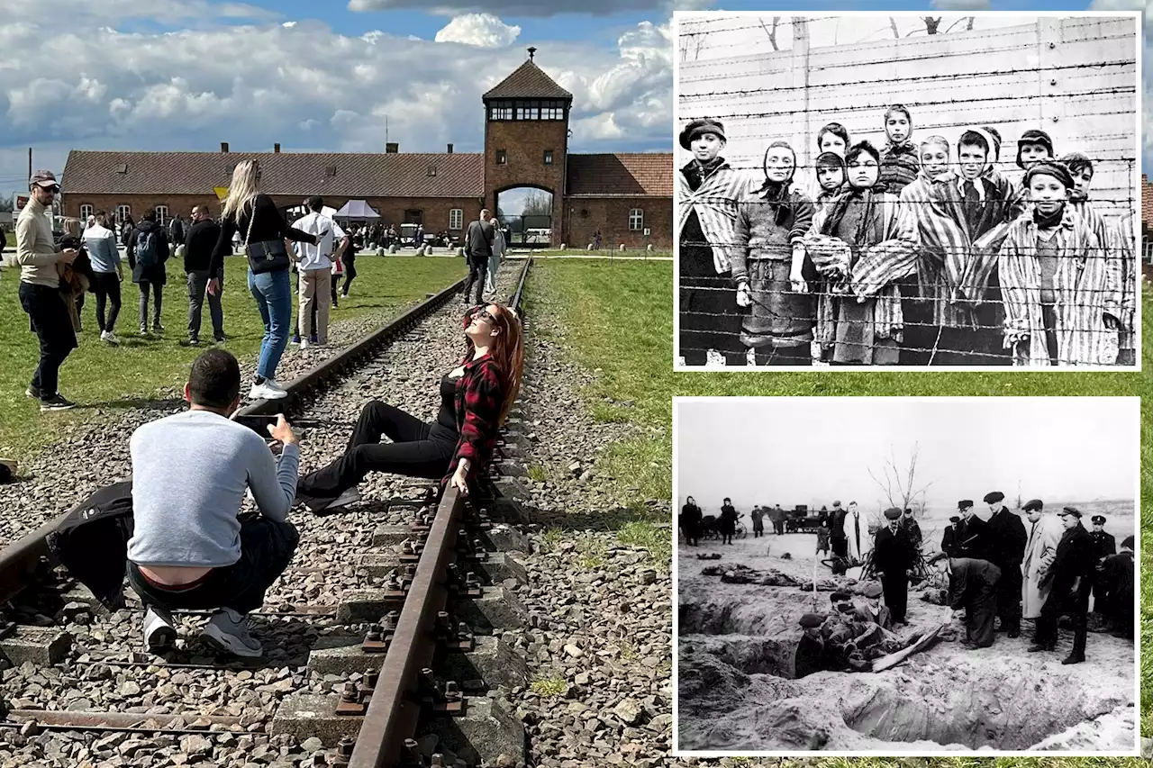 Auschwitz visitor faces backlash for posing for tasteless photo on train tracks