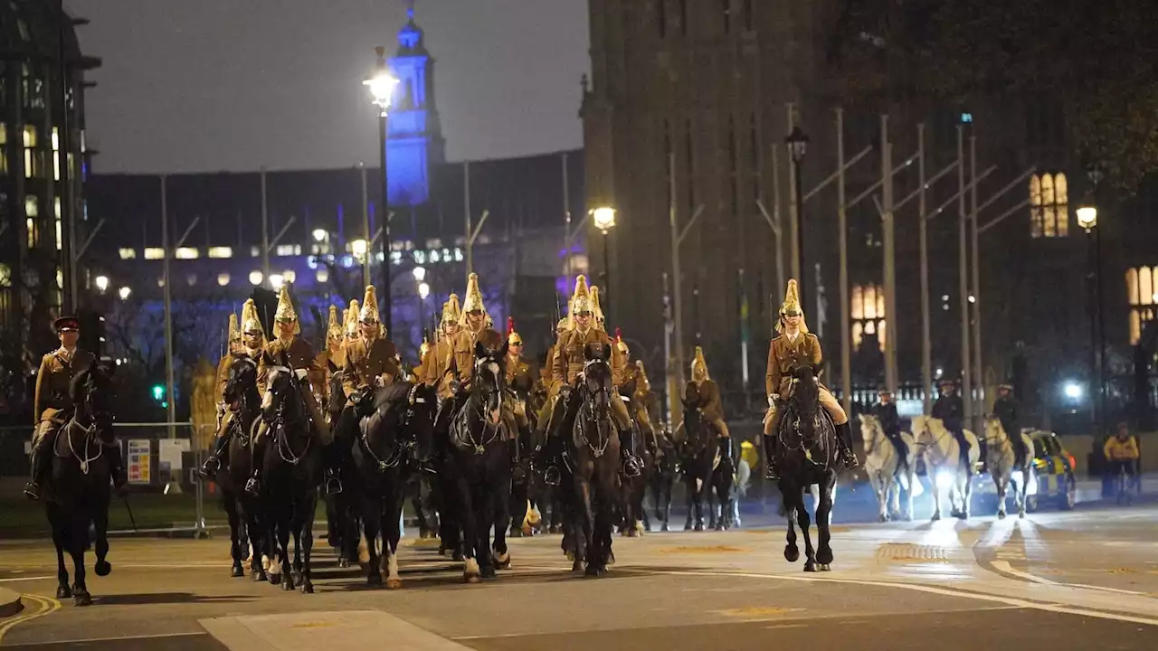 King's coronation: Midnight rehearsal takes place in London as military parade through empty streets