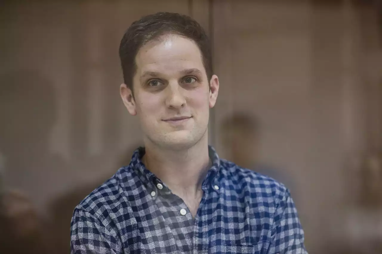 WSJ reporter looks defiant as he appears in court after arrest by Vlad's goons