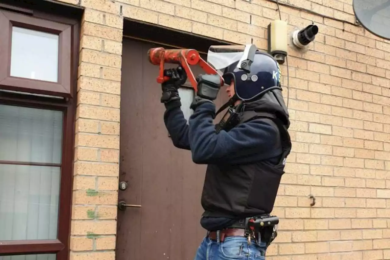 Drugs and cash seized after cops raid four properties