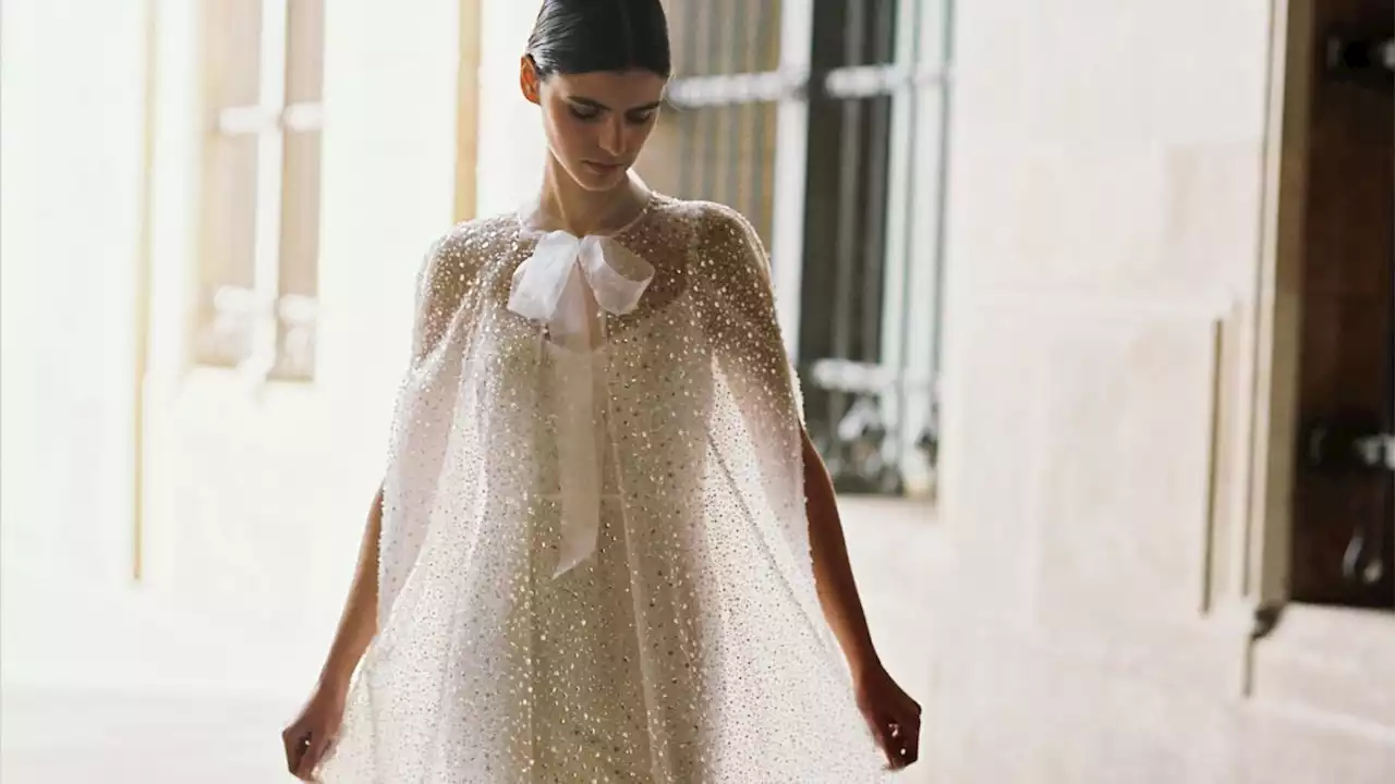 This Untraditional Wedding Dress Trend Lends Itself to Double the Drama