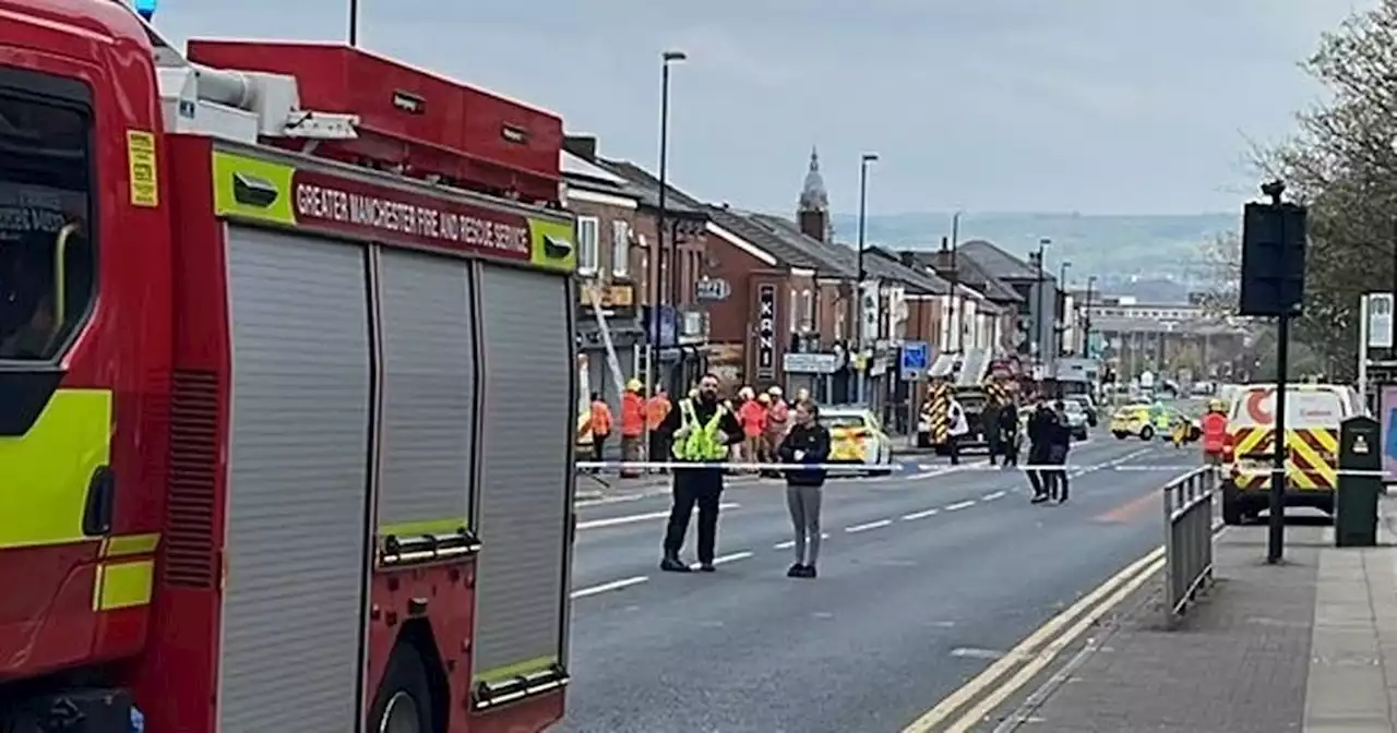 Car smashes into shop after chase causing gas leak and leaving woman in hospital