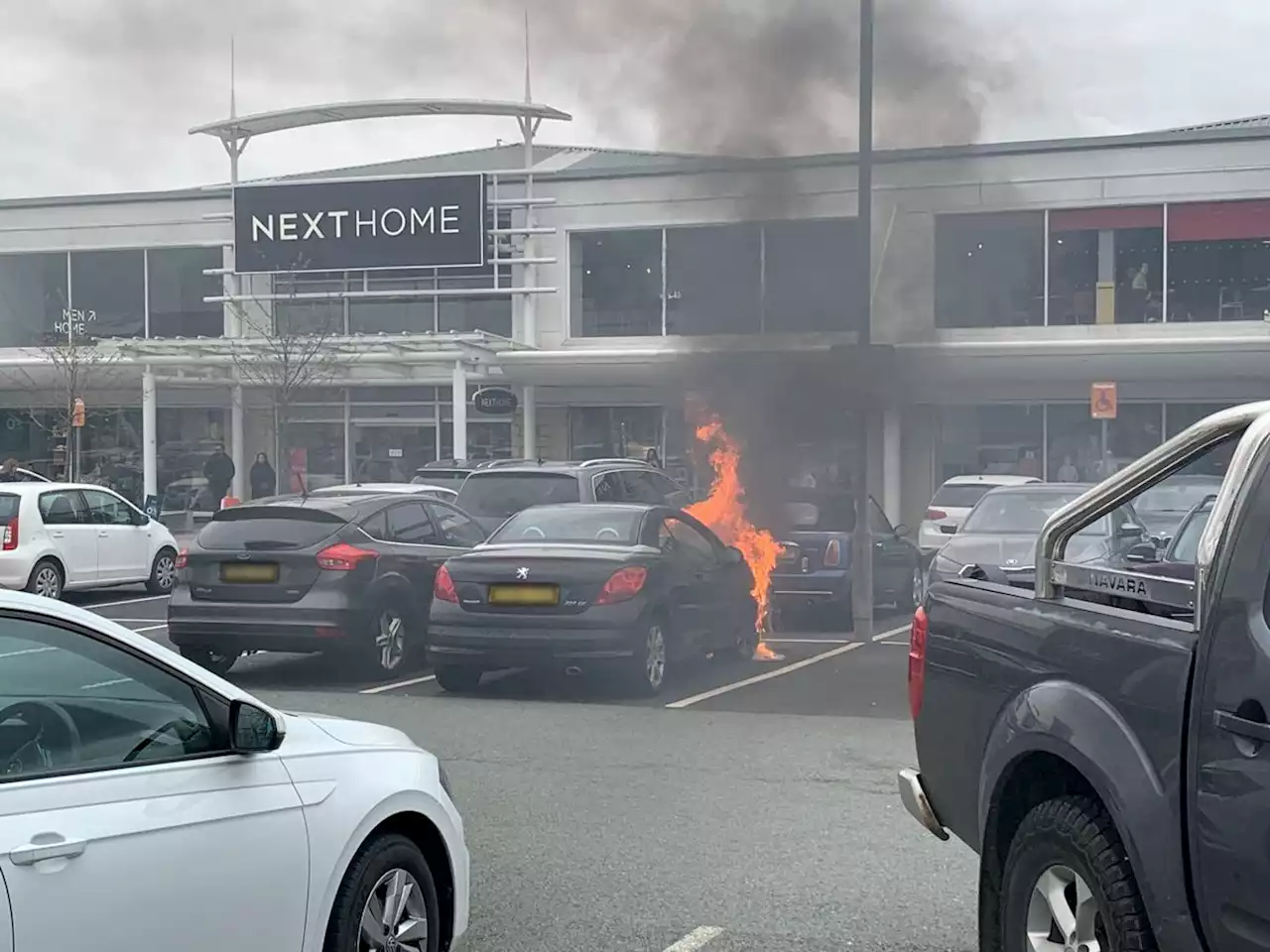 Fire engulfs car at busy Telford retail park