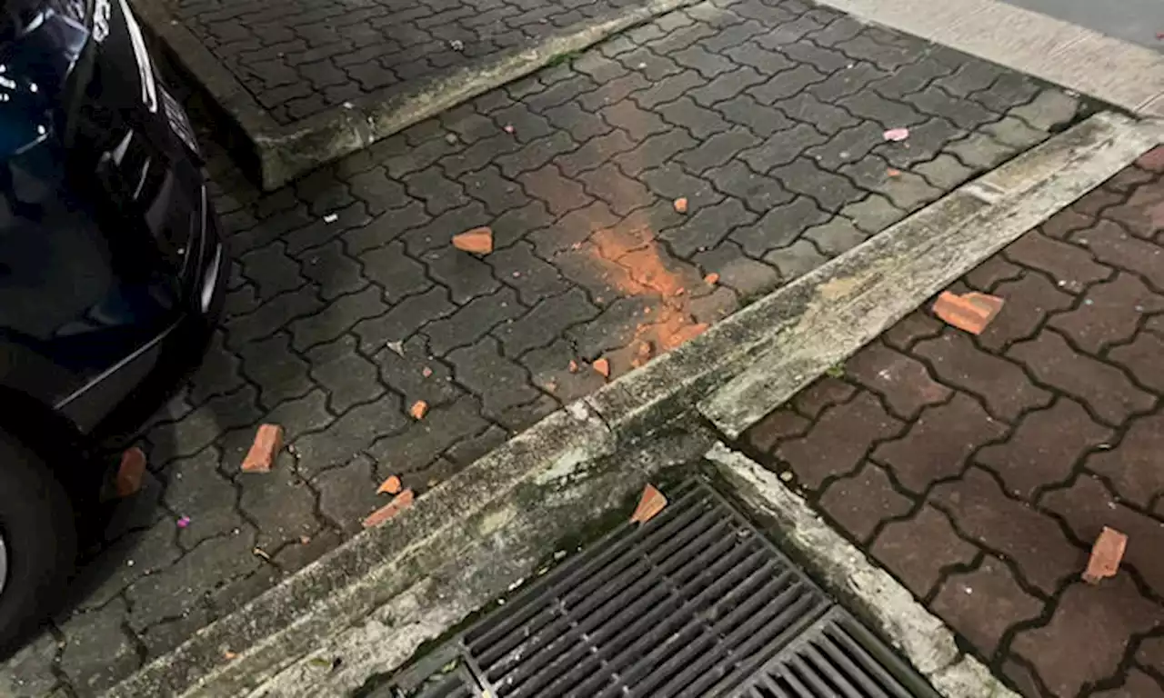 Man throws bricks down Jalan Bukit Merah block, nearly injuring resident