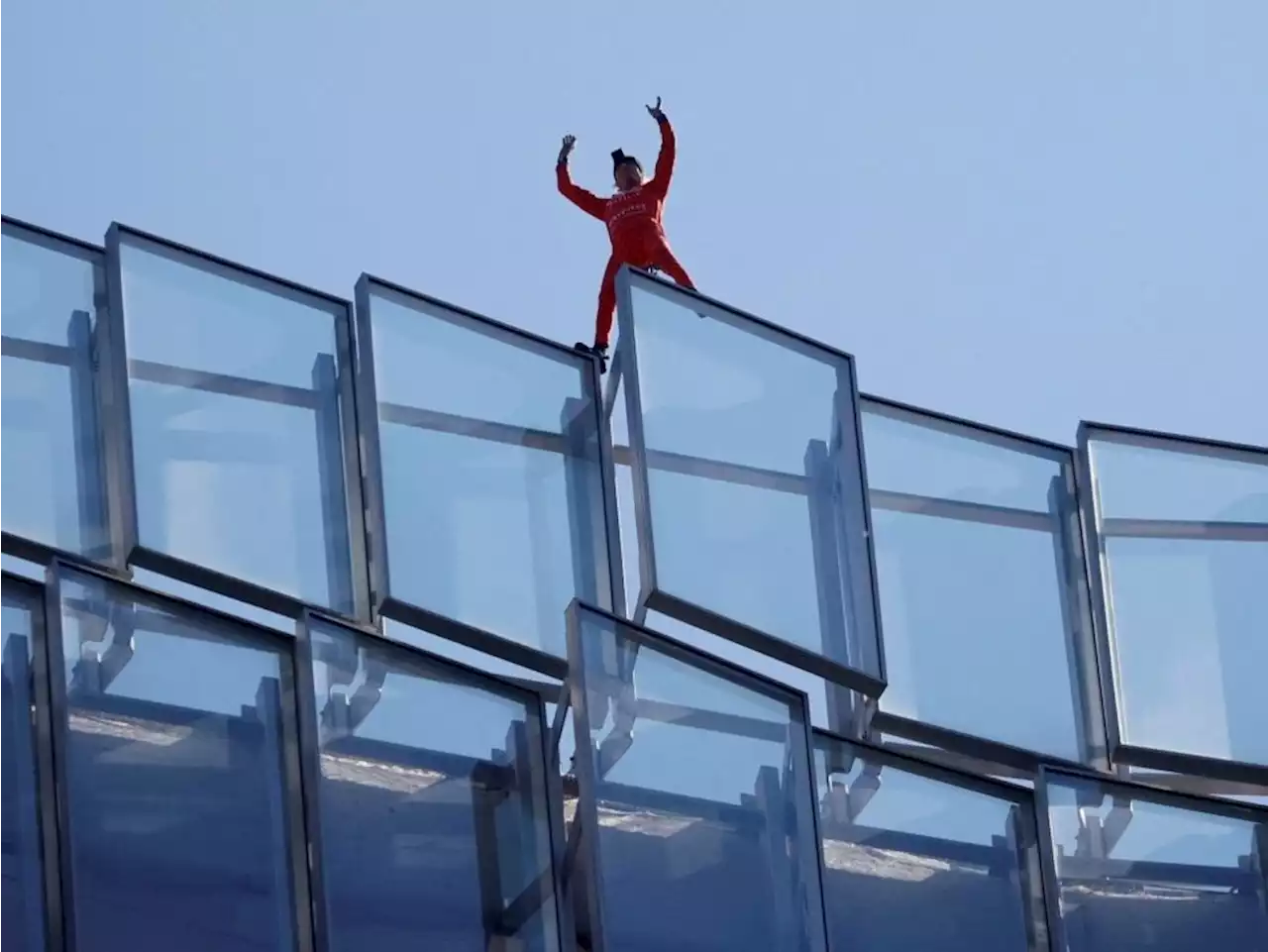 'French Spiderman' climbs Paris skyscraper to protest pension law