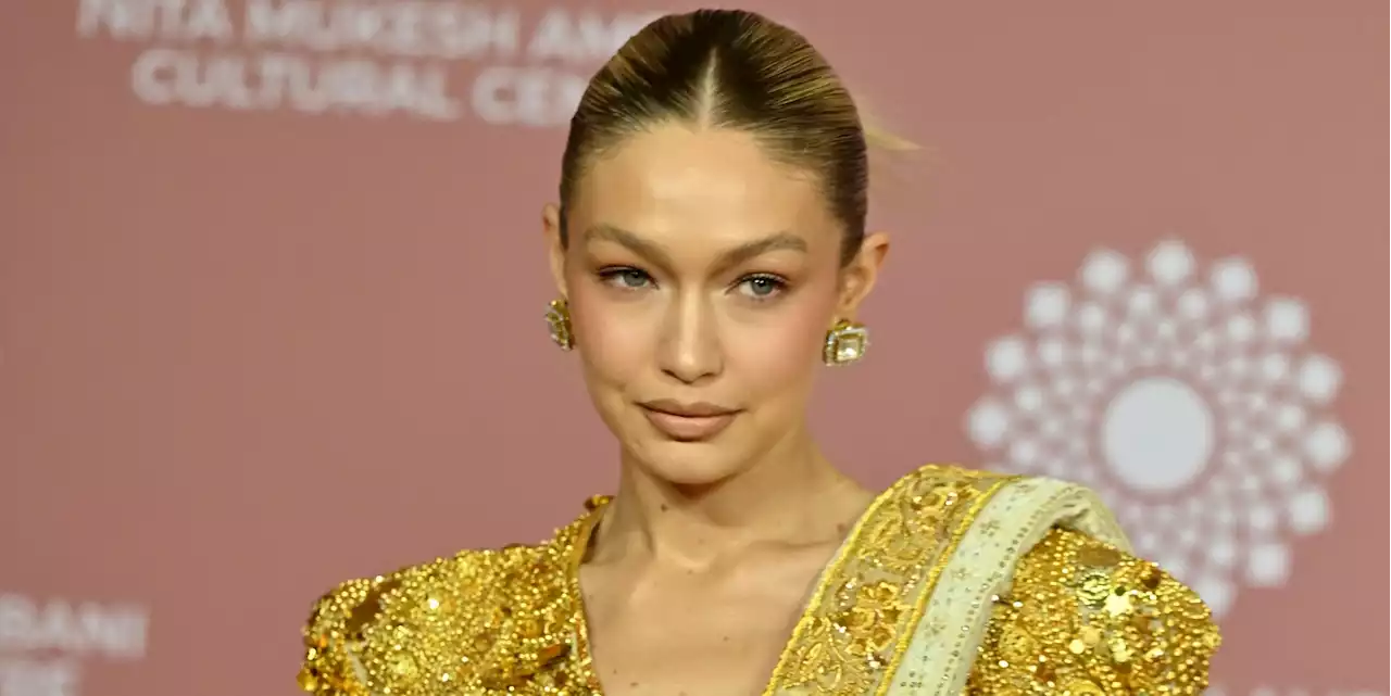 Gigi Hadid Shines in an Ornate Golden Sari and Matching Jewelry in Mumbai