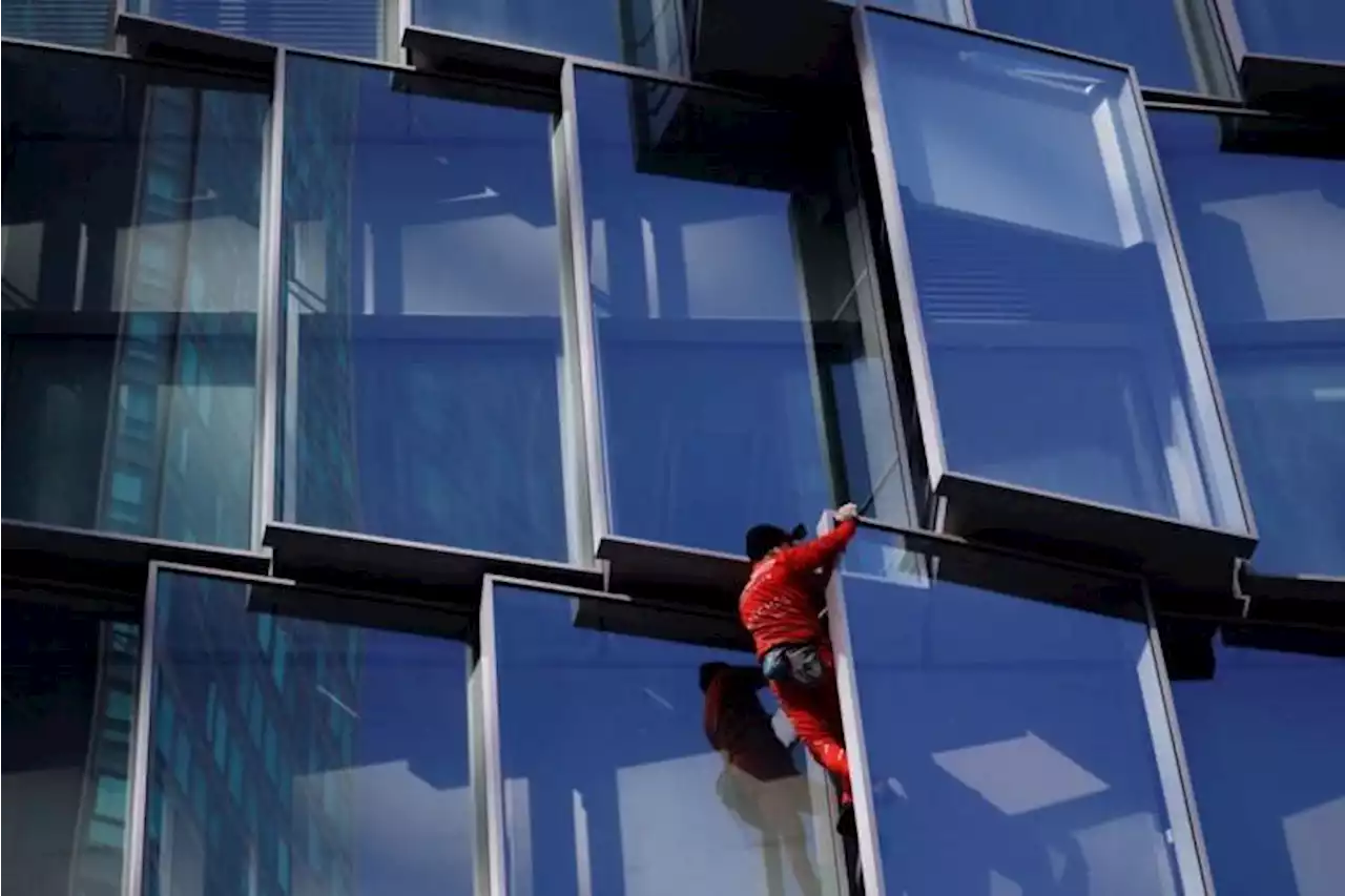 'French Spiderman' climbs Paris skyscraper as protest against pension law