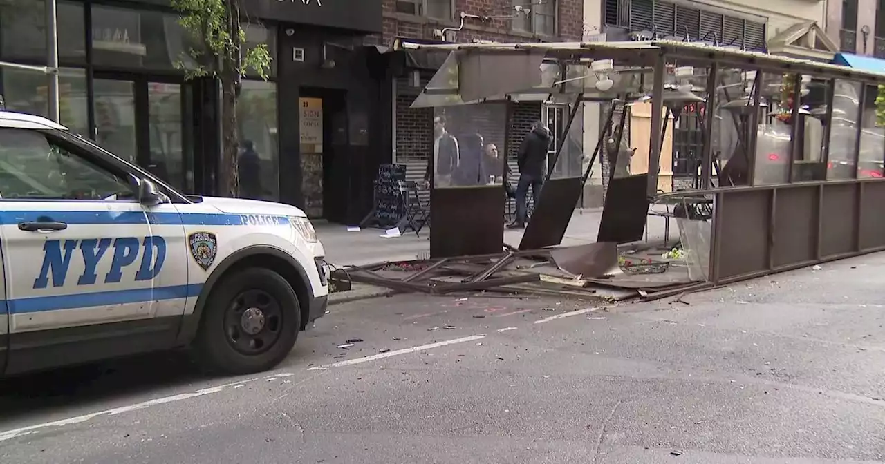 NYPD: Suspect at large after crashing into officer, outdoor dining structure while fleeing police in Manhattan