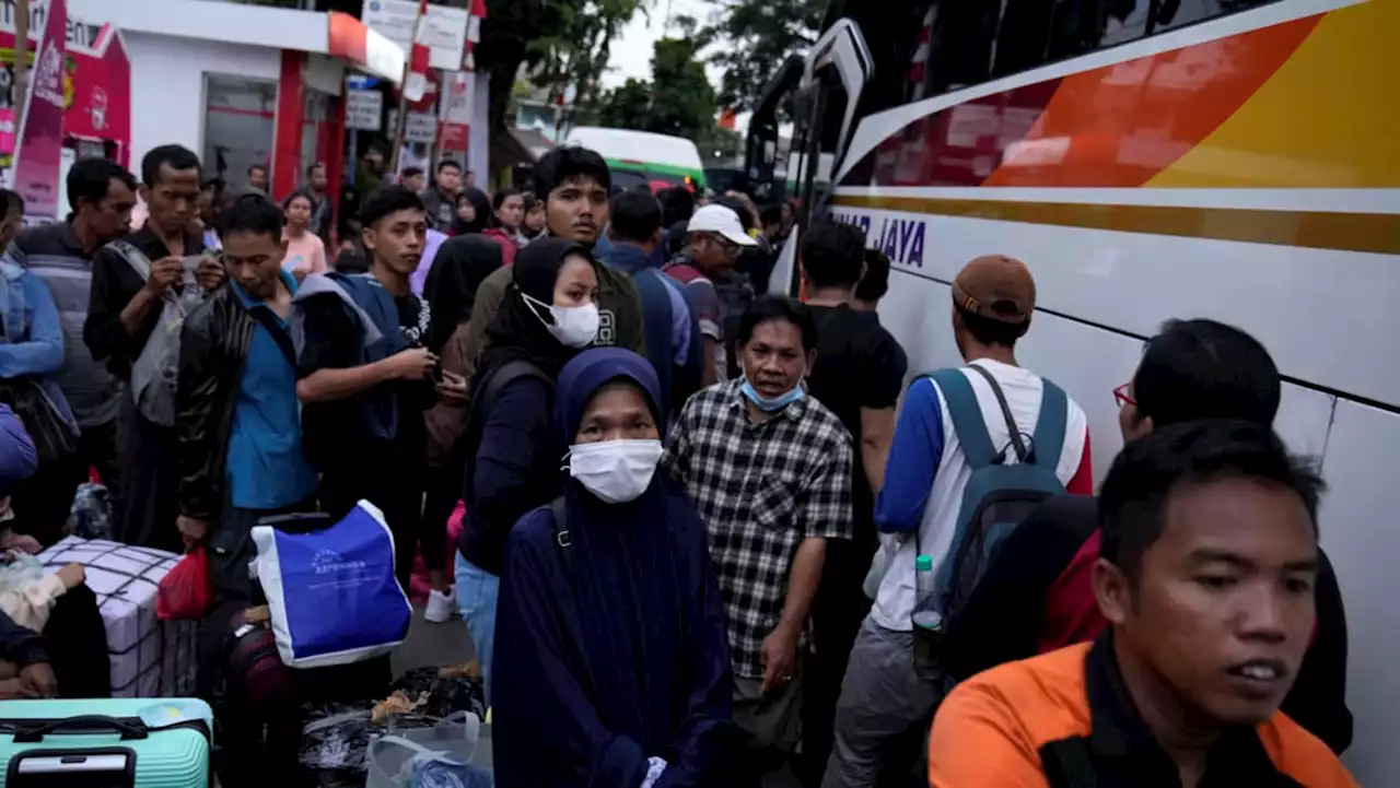 Millions of Indonesians expected to travel home for Eid, in one of the busiest mass exodus in years