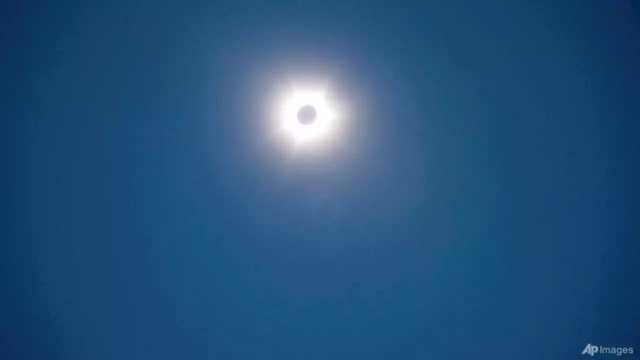 Stargazers witness dazzling solar eclipse in Australia