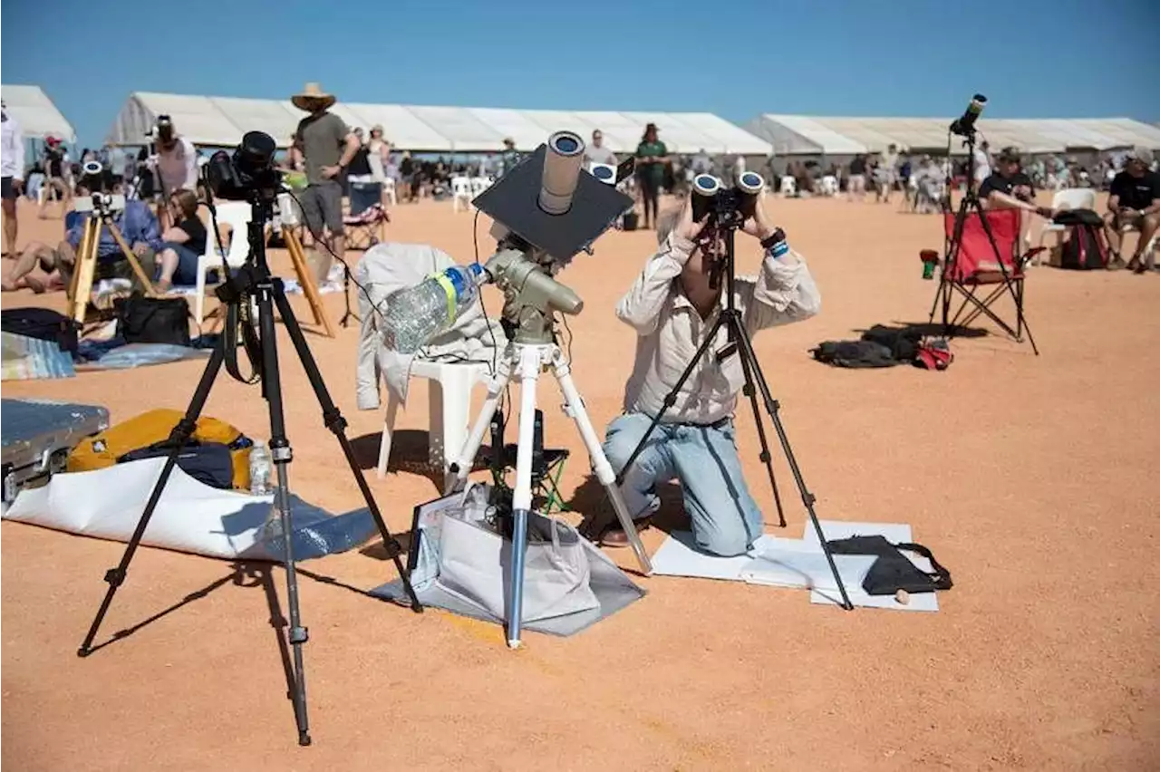 Stargazers witness dazzling solar eclipse in Australia