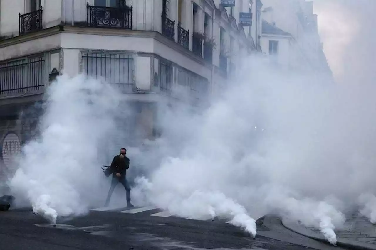 Tear gas fired as Macron faces more hostile crowds in rural France