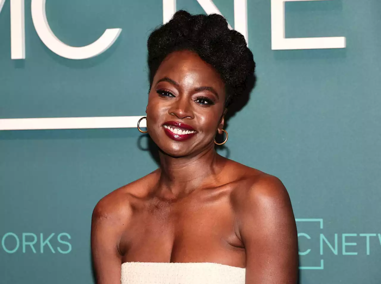 Danai Gurira Shines in Strapless White Top and Maxiskirt at ‘The Walking Dead’ Reunion During AMC Networks’ 2023 Upfront Event