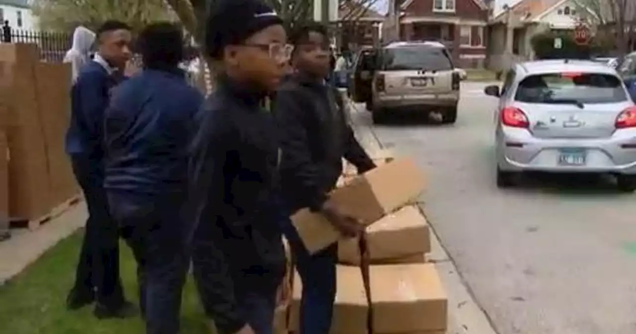 St. Sabina gives away 400 boxes of food