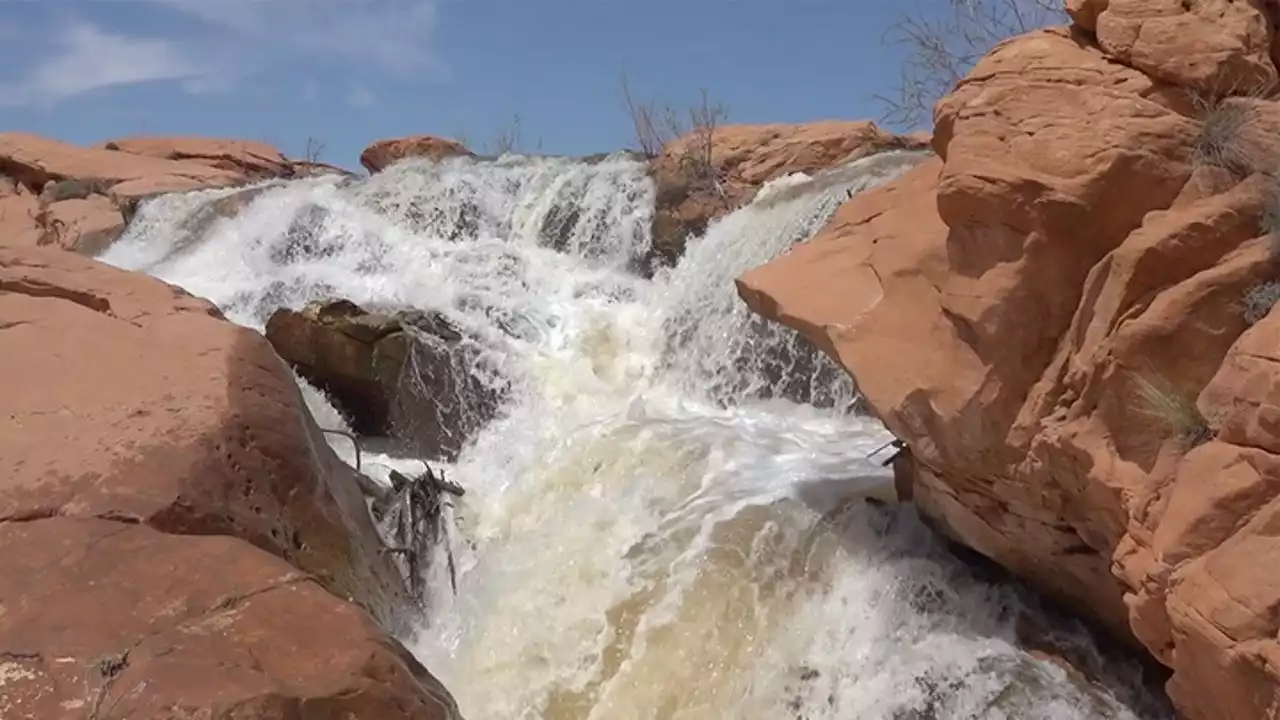 Rare desert waterfalls still flowing a month after record snowfall awakened them