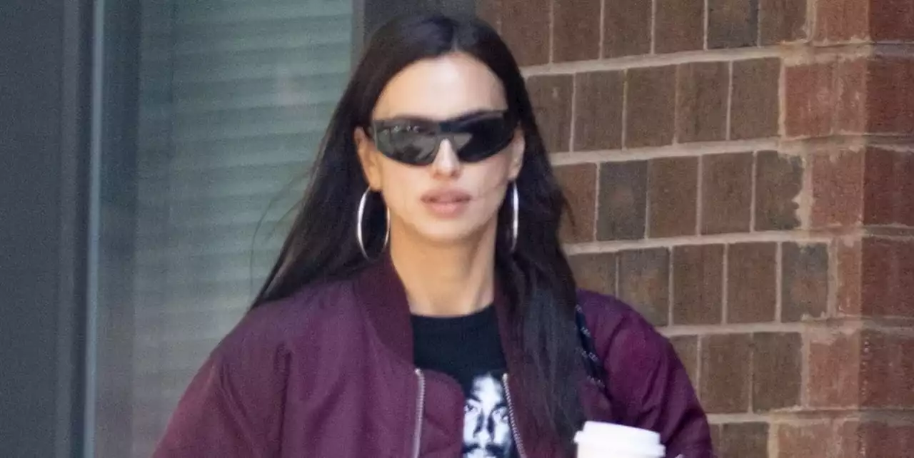 Irina Shayk Pairs her Leather Short Shorts with Knee-High Boots and a Tupac Shakur T-Shirt