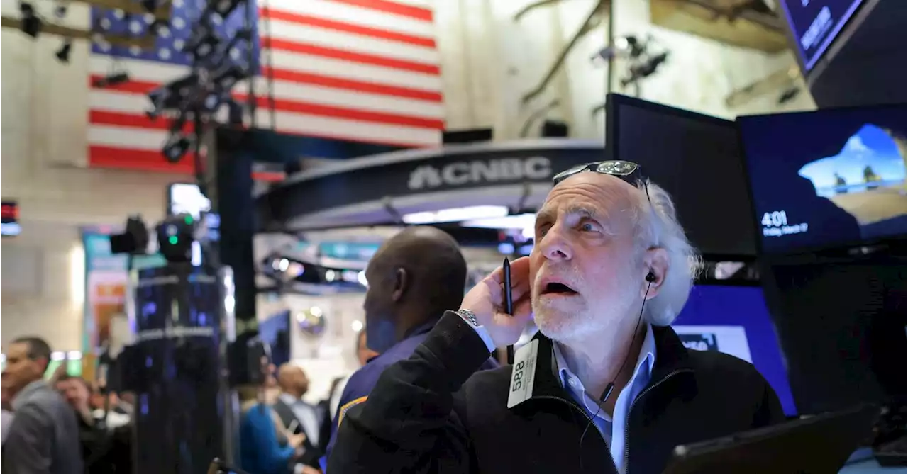 Wall St subdued at open, focus on business activity data