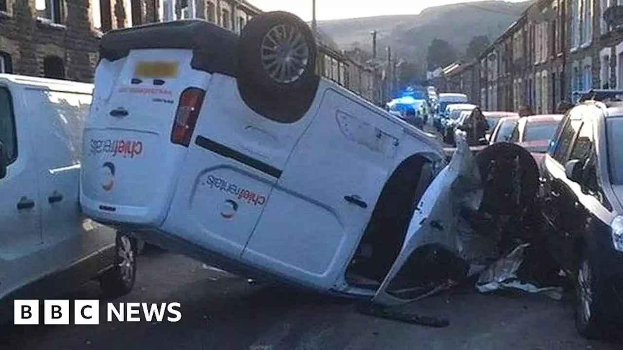 Pentre: Van lands on roof after crash on terraced street