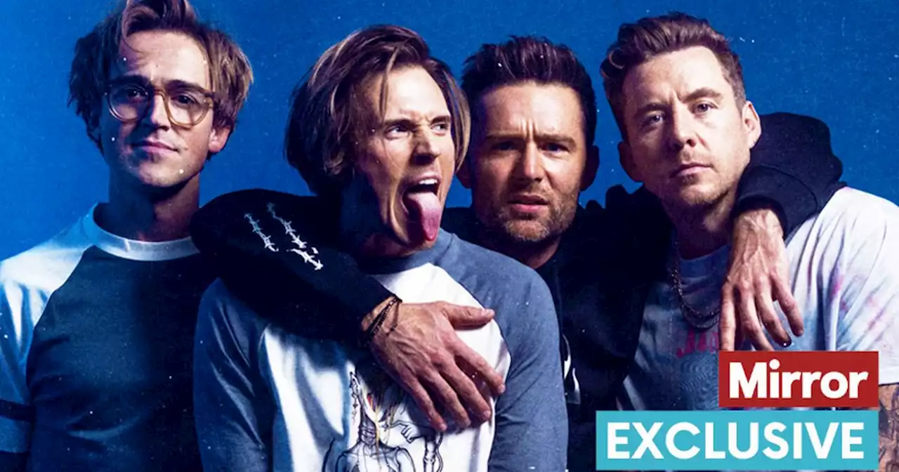 Boy band McFly say their nights out with friend Paul O'Grady were 'crazy'