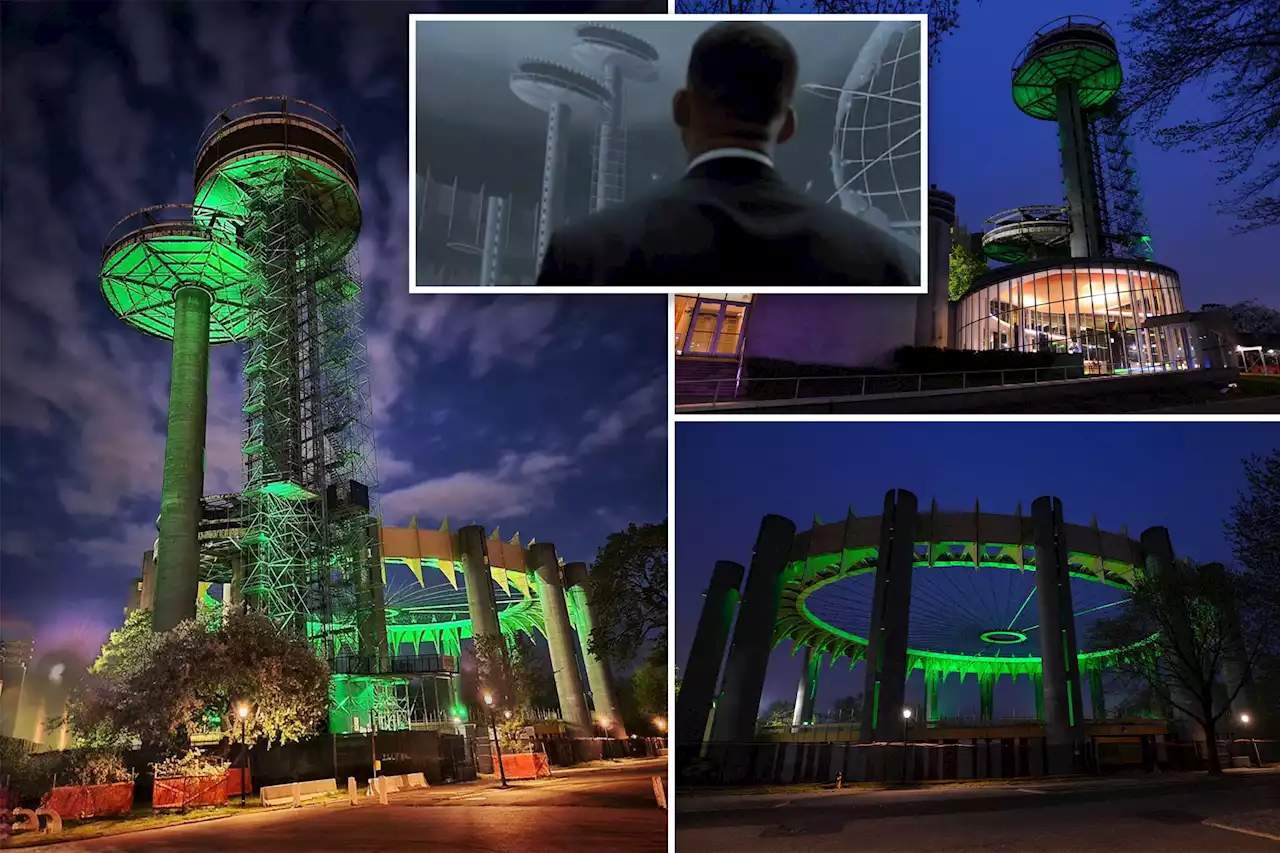 Iconic ‘Men in Black’ spaceship towers light up once again in Queens