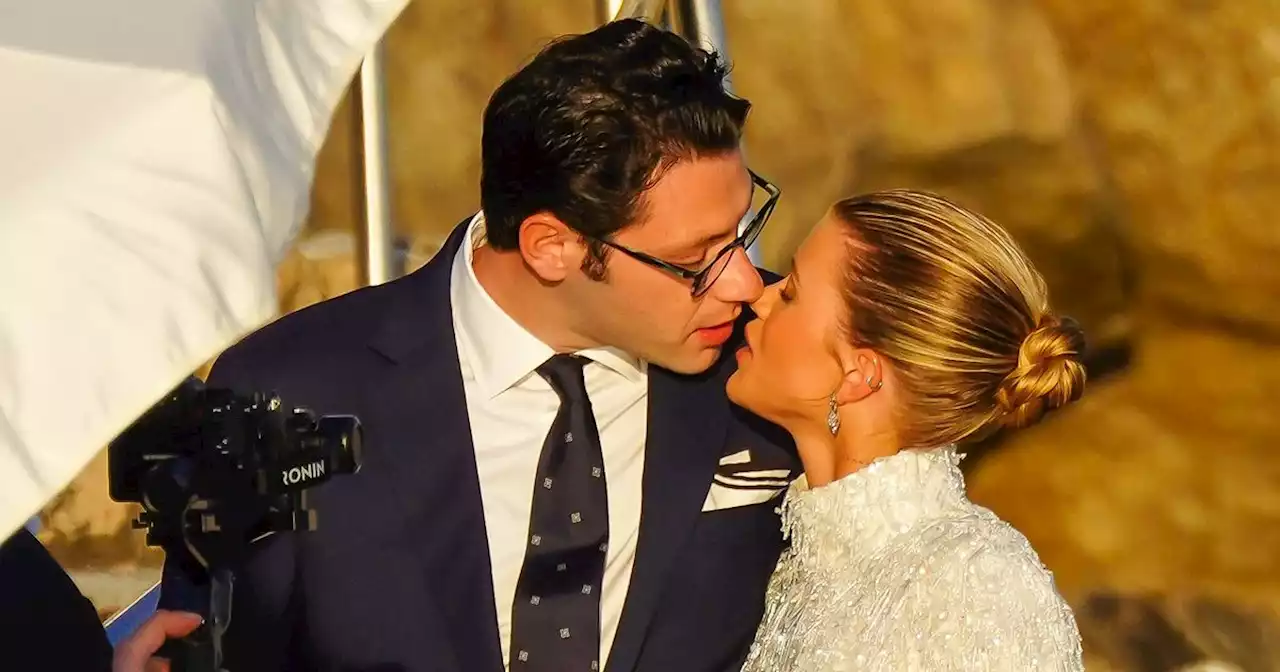 Blushing bride Sofia Richie kisses Elliott Grainge ahead of their wedding