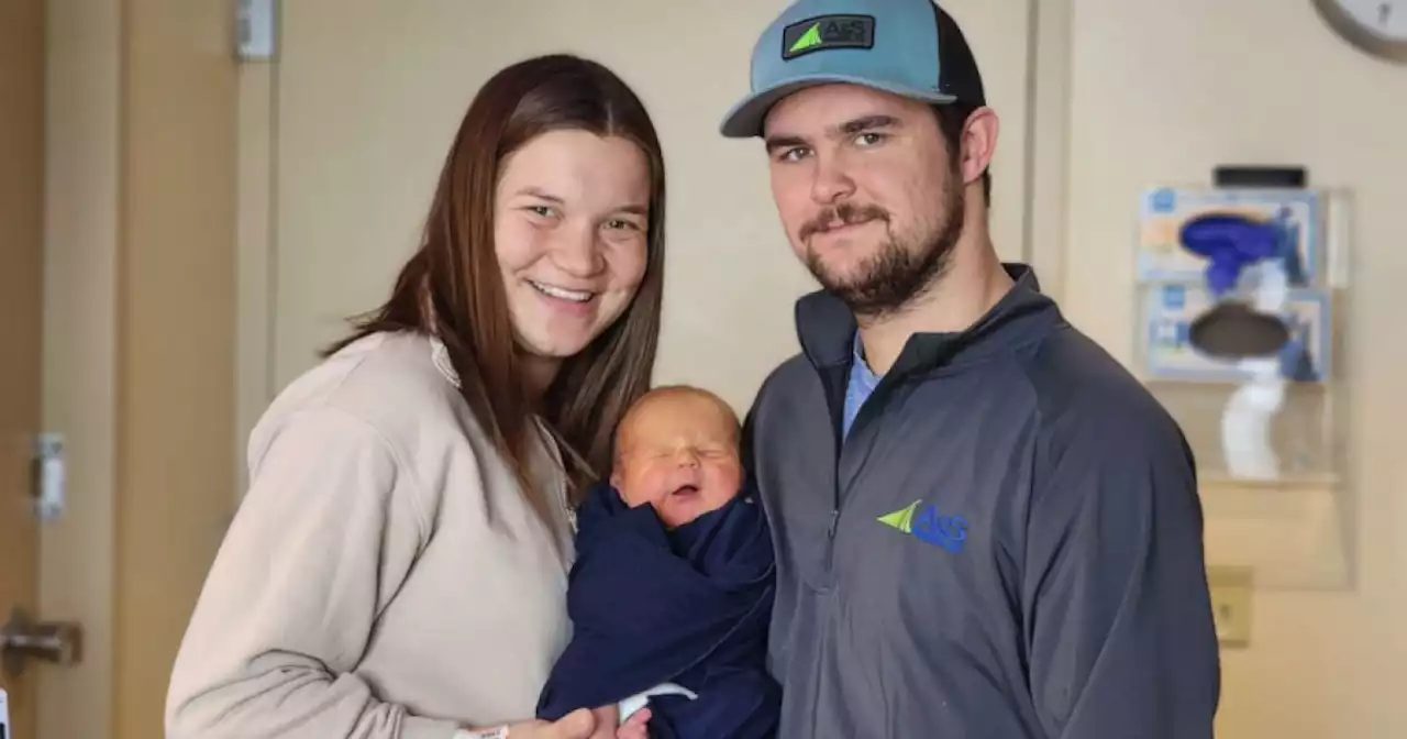 Mom, dad and newborn son all share the same birthday