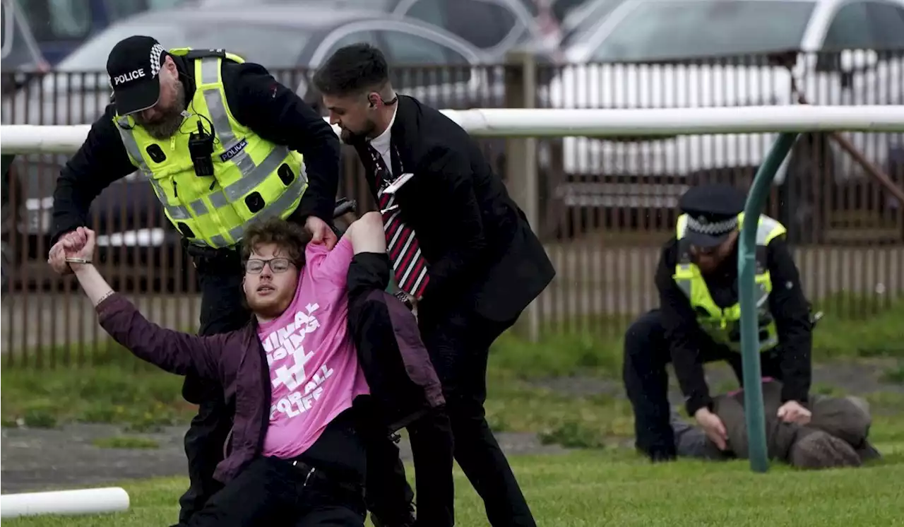 Protesters try to disrupt Scottish Grand National horse race