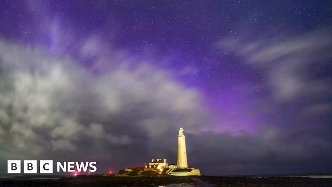 In pictures: Northern lights display sends the skies purple