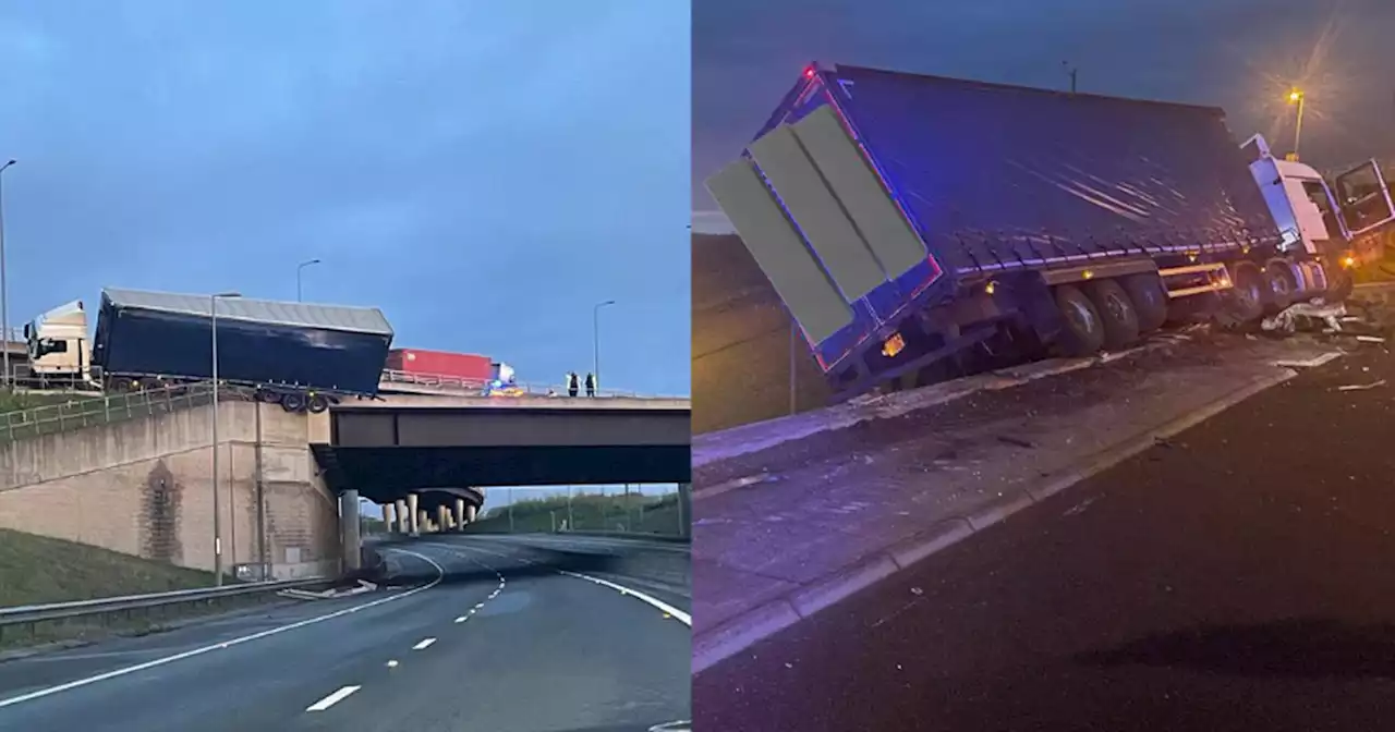 Crashed lorry overhanging bridge forces M1 closures