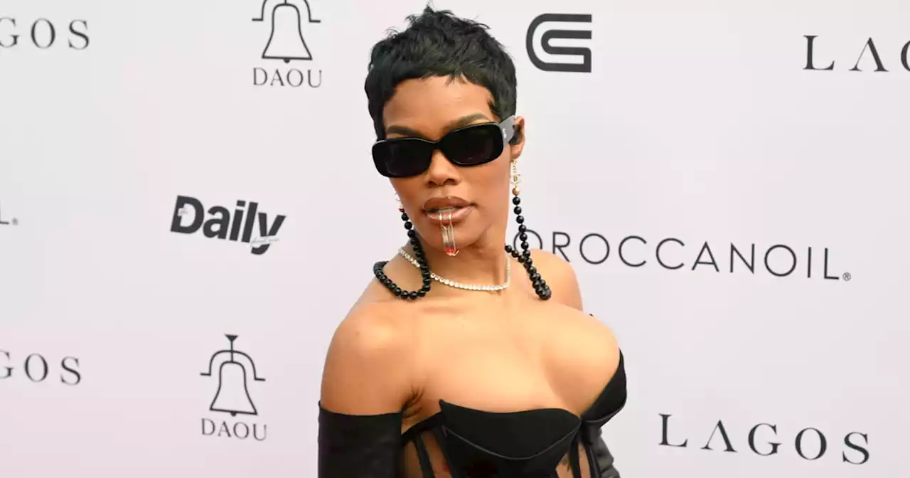 Teyana Taylor Showcases Her Tattoos and Abs in a Sheer, High-Slit Corset Dress