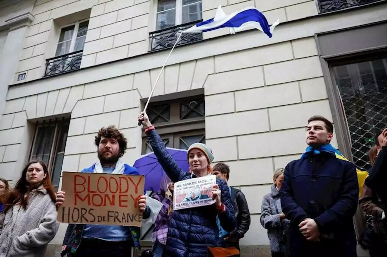 Protesters in Paris rally against 'blood money' of Putin's minister