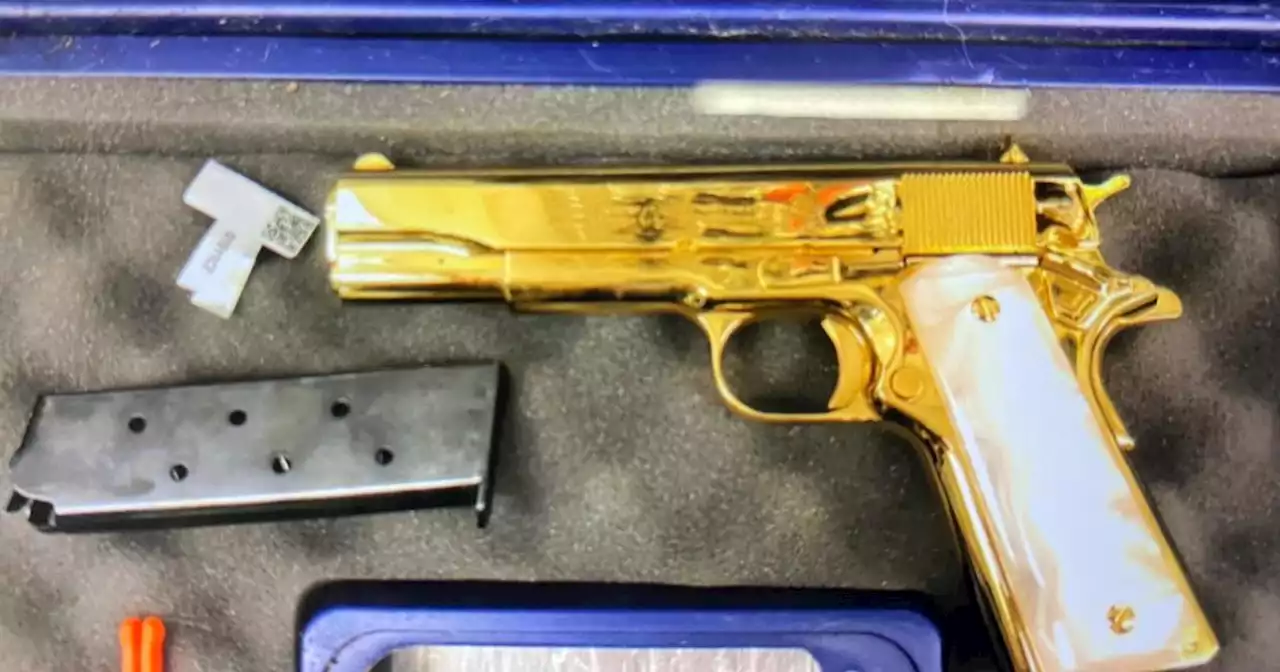 American woman arrested with 24-carat gold-plated gun in luggage at Australian airport