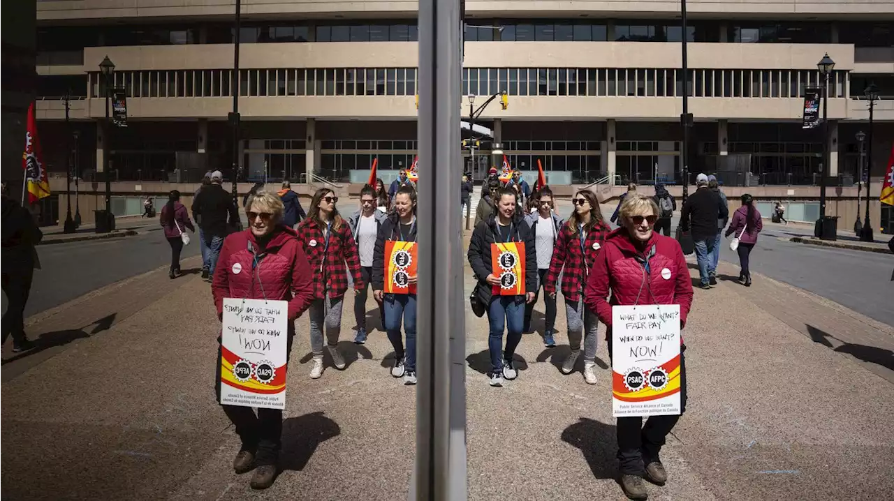 Striking public servants block access to government buildings and key infrastructure