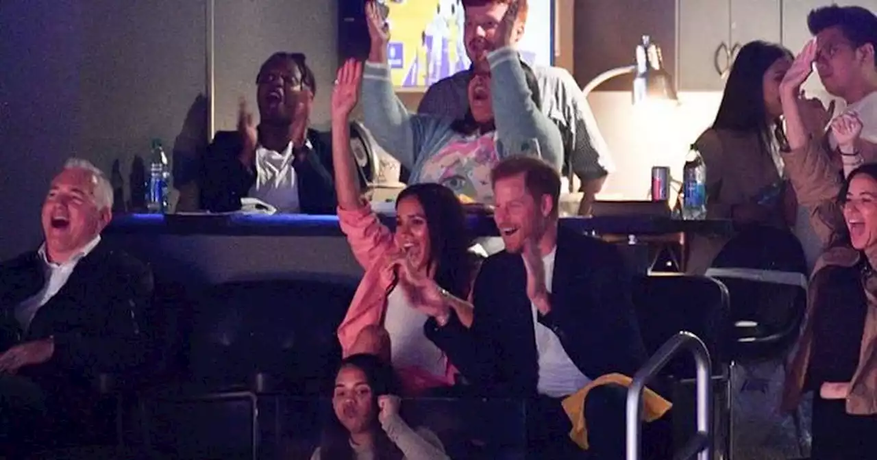 Prince Harry and Meghan Markle spotted giggling on kiss-cam at NBA game