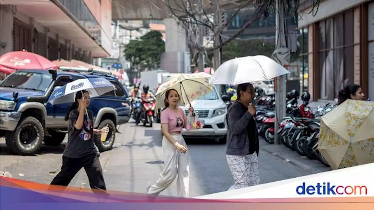 Pemandangan Warga Asia Kelabakan Diterpa Monster Panas