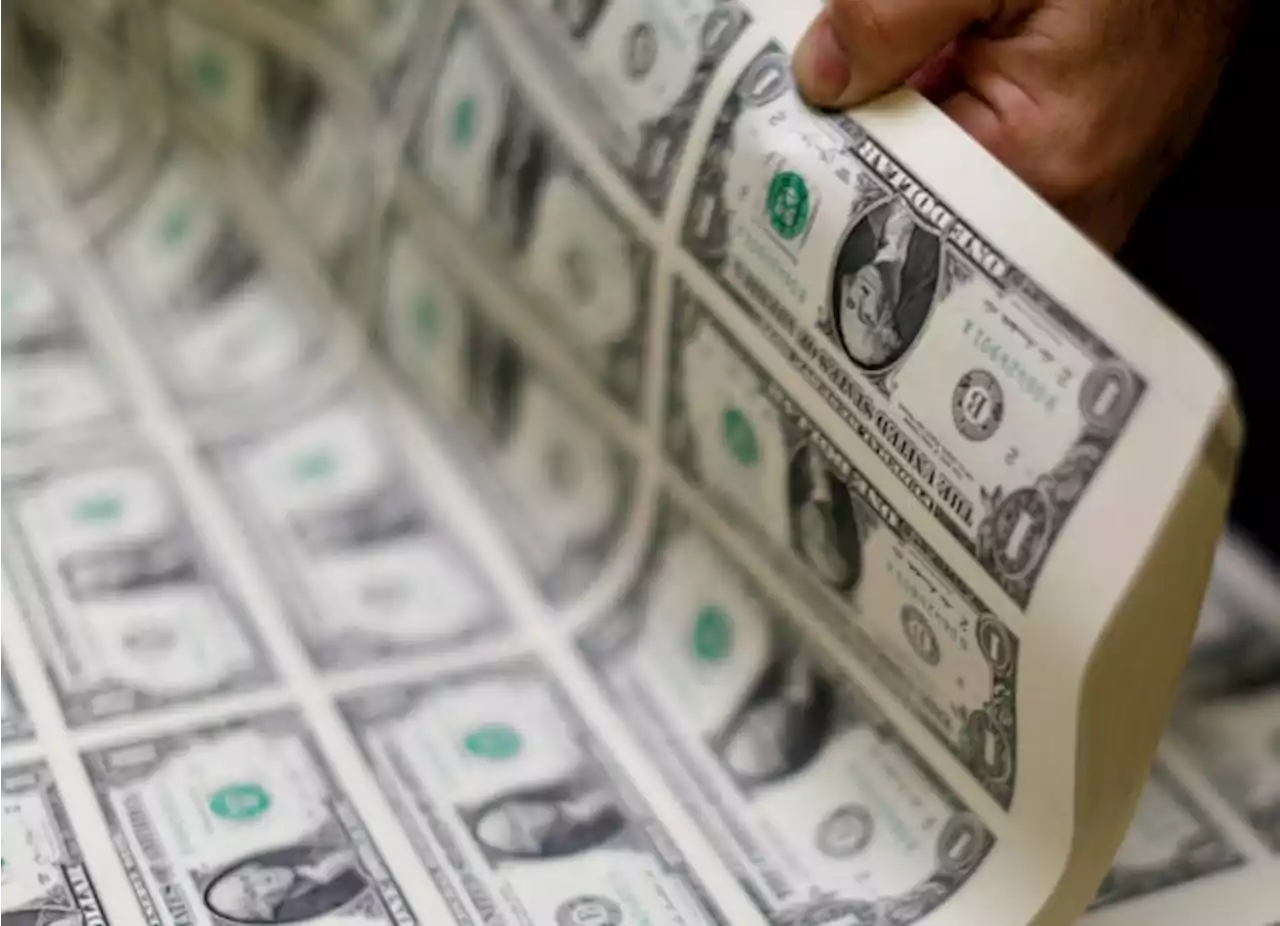 Dollar higher as banking jitters resurface, euro slips