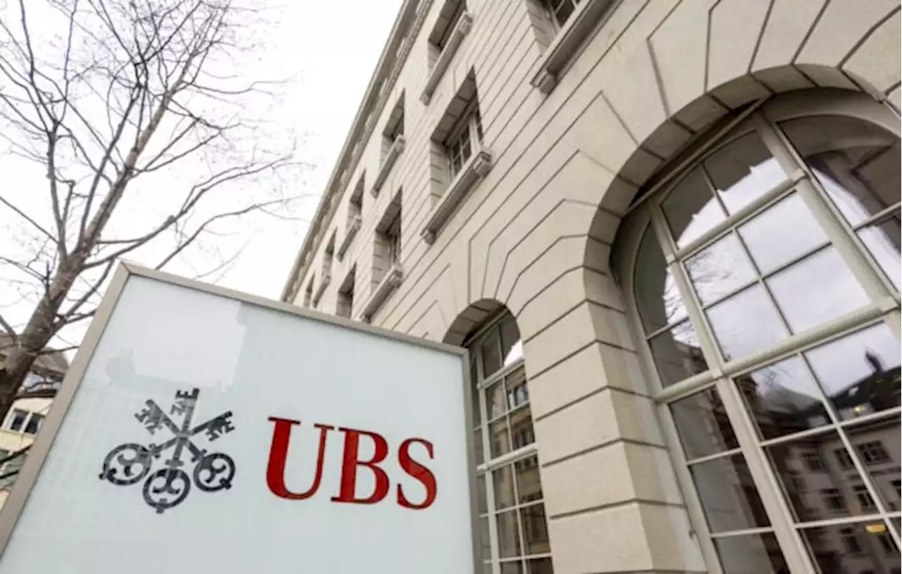 UBS quarterly profit tumbles as cost of old toxic debt mounts