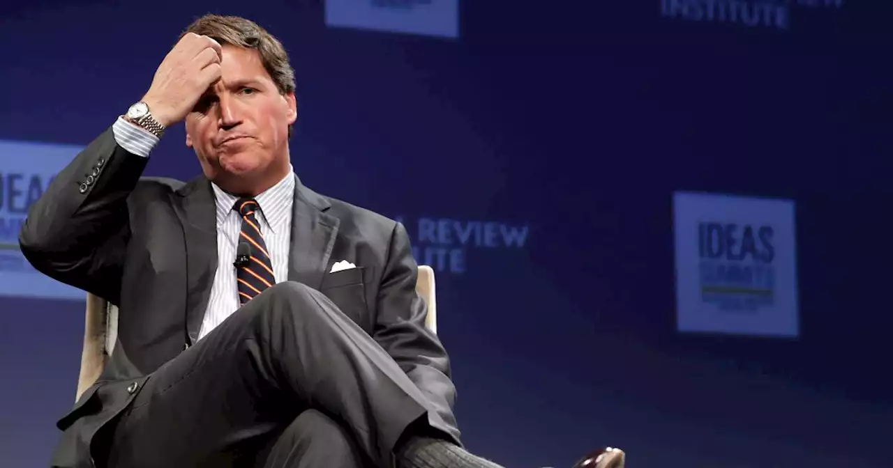 Why did Fox News fire Tucker Carlson?