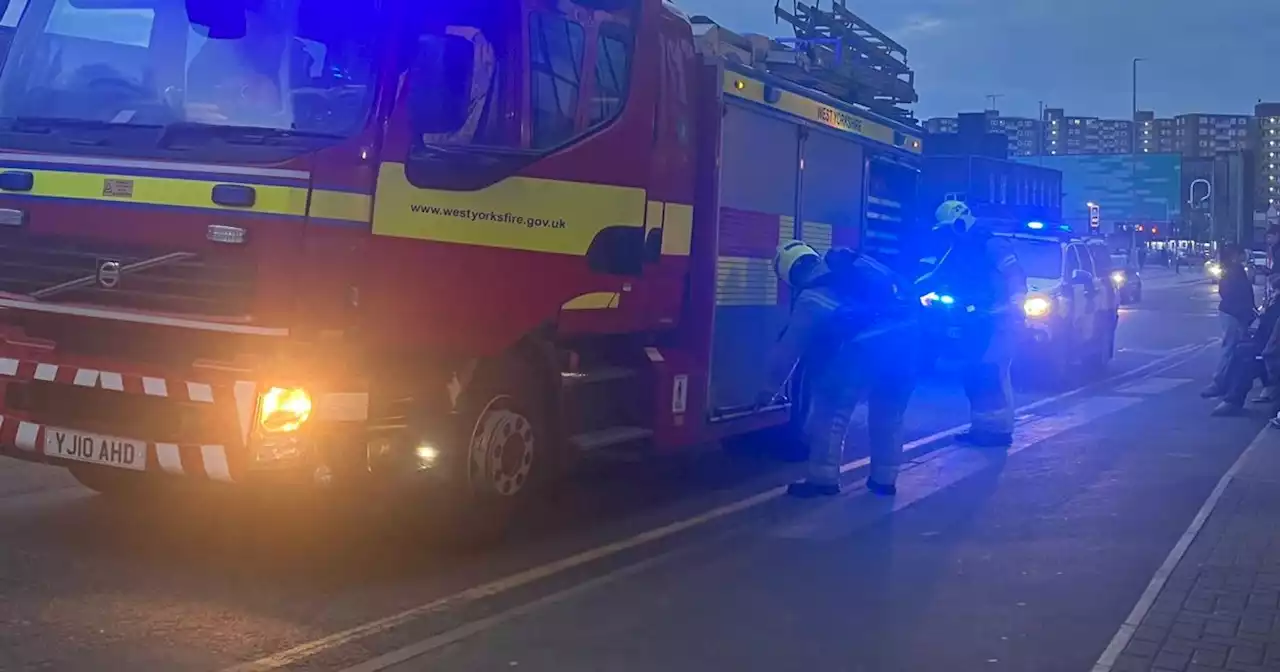 Live as Leeds flats evacuated and five fire engines called to scene